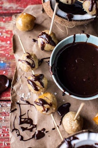 chocolate dipped coconut skewers with dipping sauce